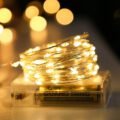 អំពូល 10ម៉ែត្រ 100LEDប្រើថ្មពិល